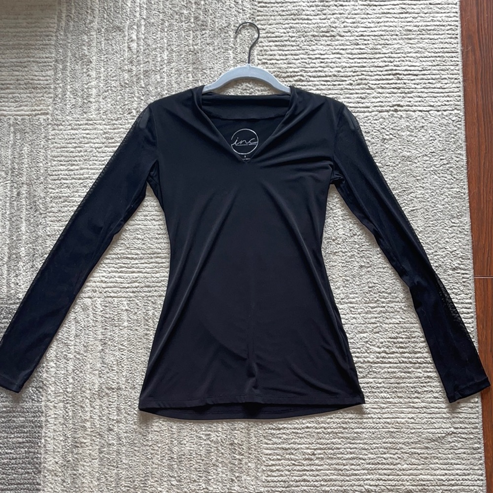 Long sleeve black dress shirt. Long sleeves are sheer mesh